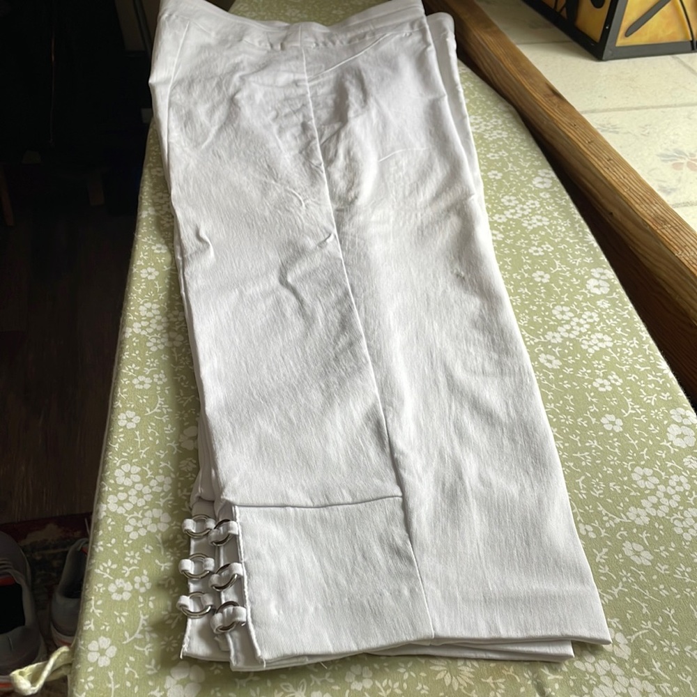 White pants; slightly cropped—smooth fit